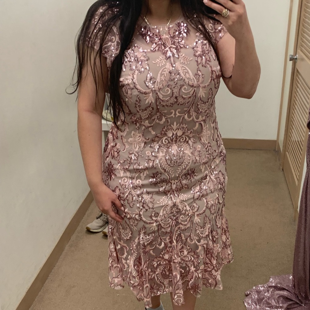 Blush pink dress. Not stretchy. Right under the knees